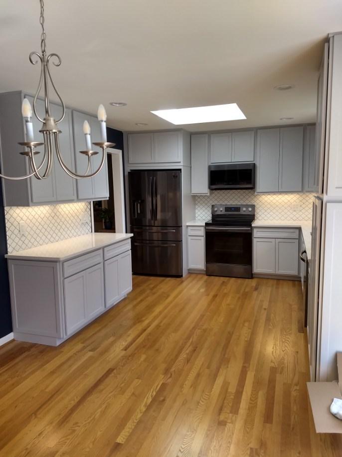 Transitional Kitchen With Contrasting Dark Walls Kitchen Remodel by Kellgard General Contracting project photo